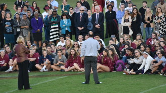 Elon football coach, Rich Skrosky, speaks to Elon community in a "Gathering of Friends" Thursday to remember Demitri Allison, who died Wednesday.