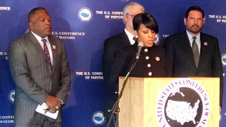 Baltimore Mayor Stephanie Rawlings-Blake calls on Presidential Candidates to highlight urban issues at an event in Iowa.