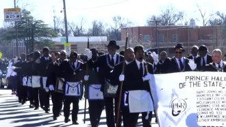 Activists marched in Greensboro's Martin Luther King, Jr. parade.