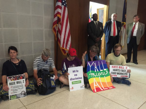 Protestors "sit-in" outside Speaker of the House Tim Moore's office in the North Carolina General Assembly building in Raleigh on Monday, April 25, 2016. 
