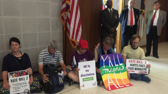 Protestors "sit-in" outside Speaker of the House Tim Moore's office in the North Carolina General Assembly building in Raleigh on Monday, April 25, 2016.